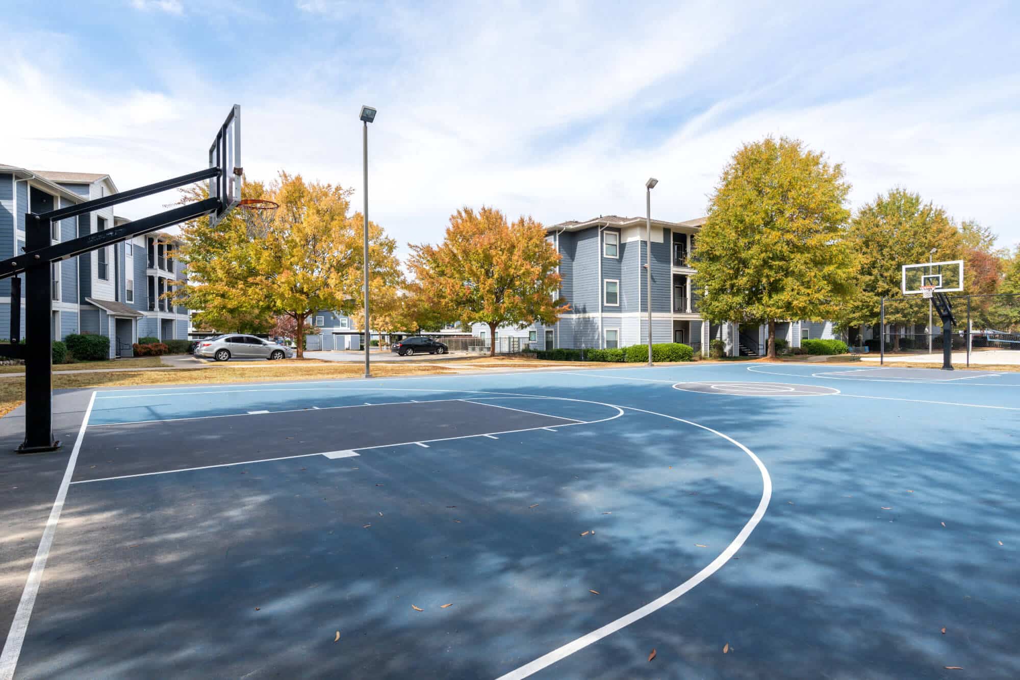 the mill at auburn off campus apartments near auburn university community amenities lighted full size basketball court