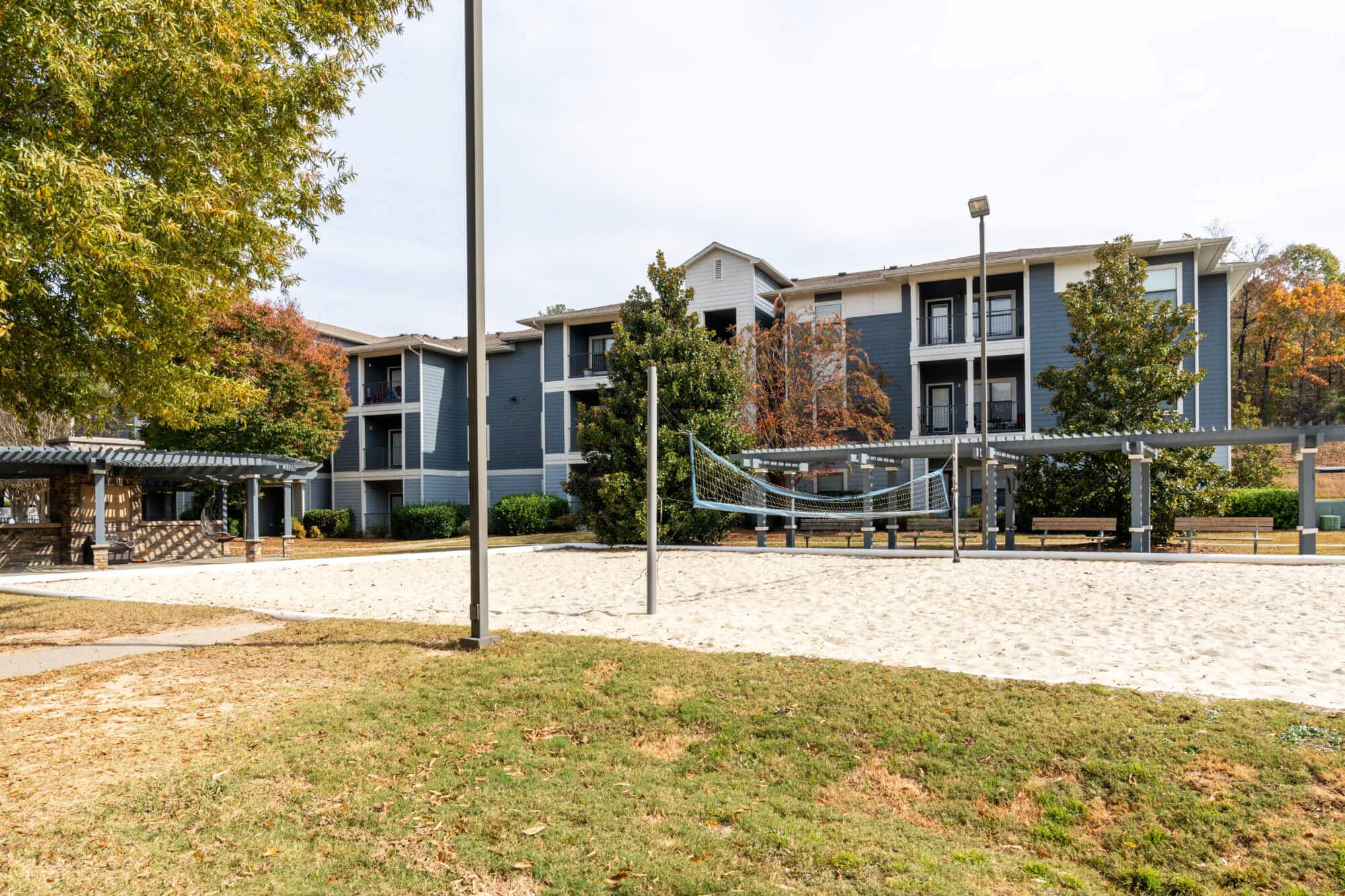 the mill at auburn off campus apartments near auburn university community amenities sand volleyball court